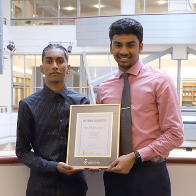 Photo of Alagan Balakumar and Sanju Selvendran, winners of the Market Simulation Challenge.